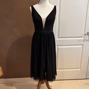 Elegant Black Midi Dress with Plunging Neckline